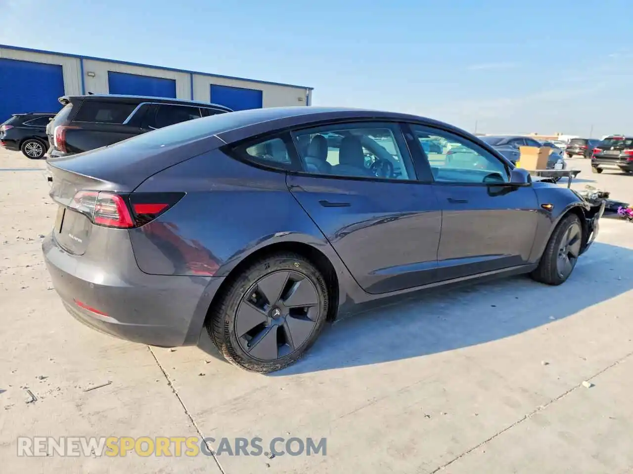 3 Photograph of a damaged car 5YJ3E1EB1NF171993 TESLA MODEL 3 2022