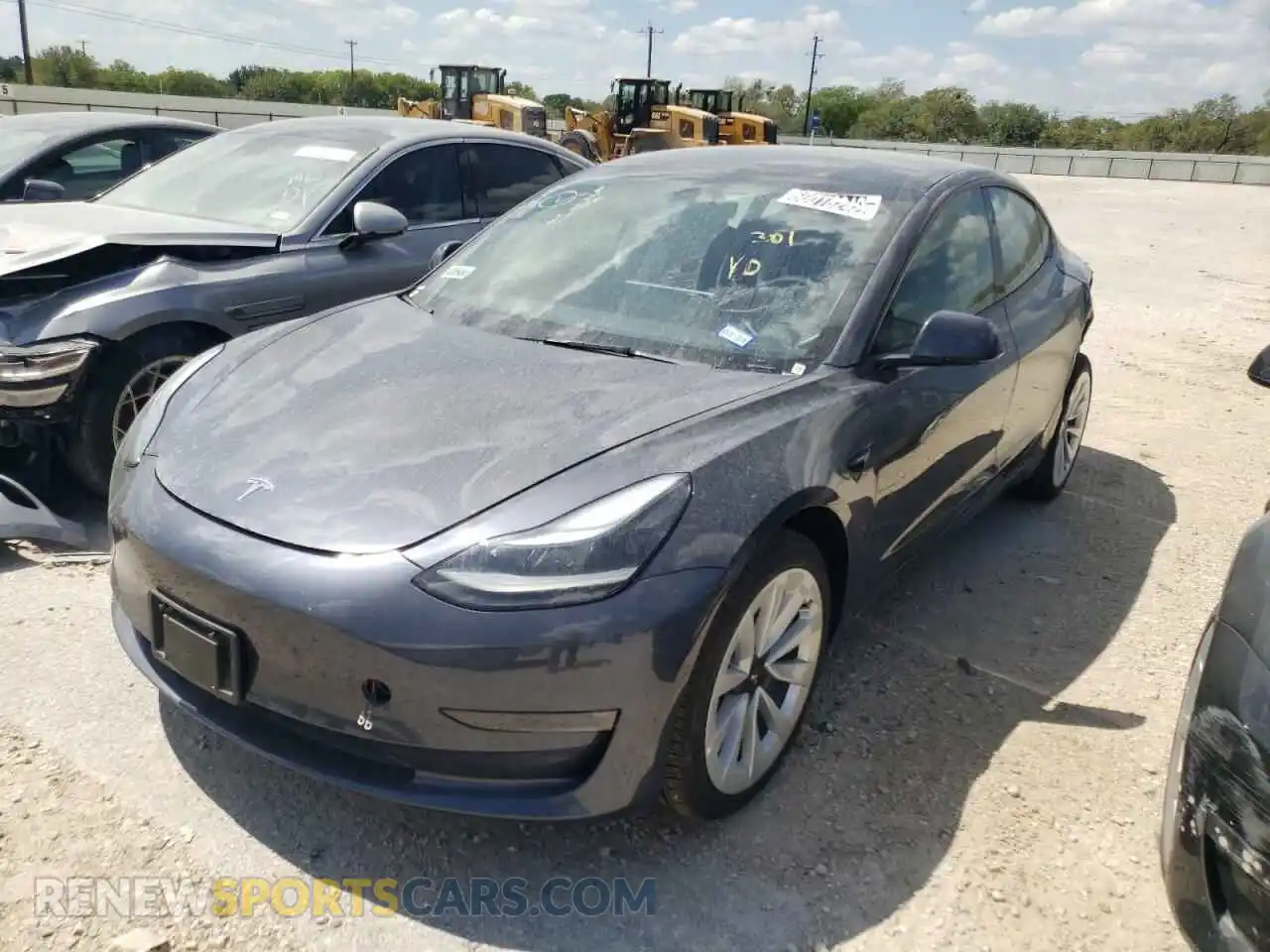 2 Photograph of a damaged car 5YJ3E1EB1NF189832 TESLA MODEL 3 2022