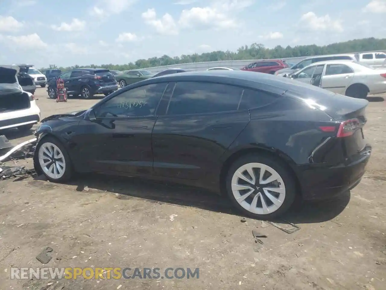 2 Photograph of a damaged car 5YJ3E1EB1NF233540 TESLA MODEL 3 2022