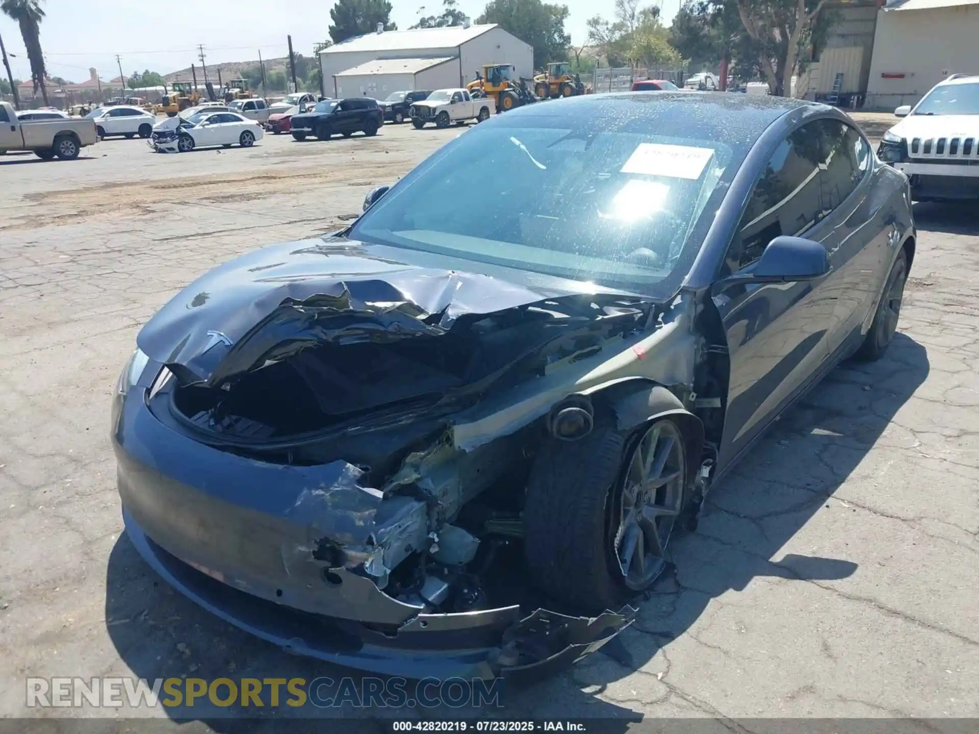 2 fotografías del automóvil dañado 5YJ3E1EB1NF239354 TESLA MODEL 3 2022