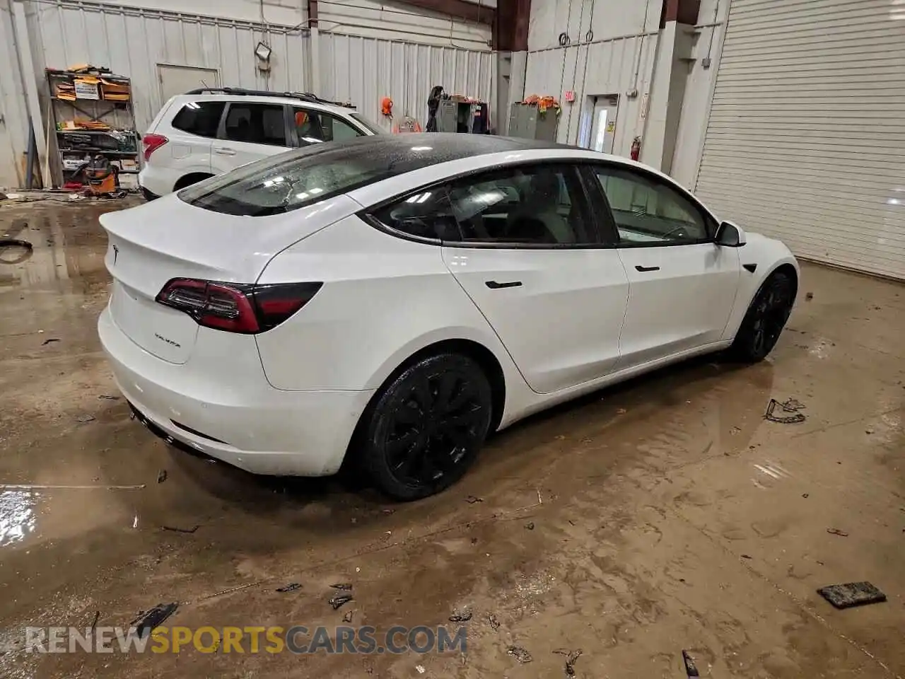 3 Photograph of a damaged car 5YJ3E1EB1NF243923 TESLA MODEL 3 2022