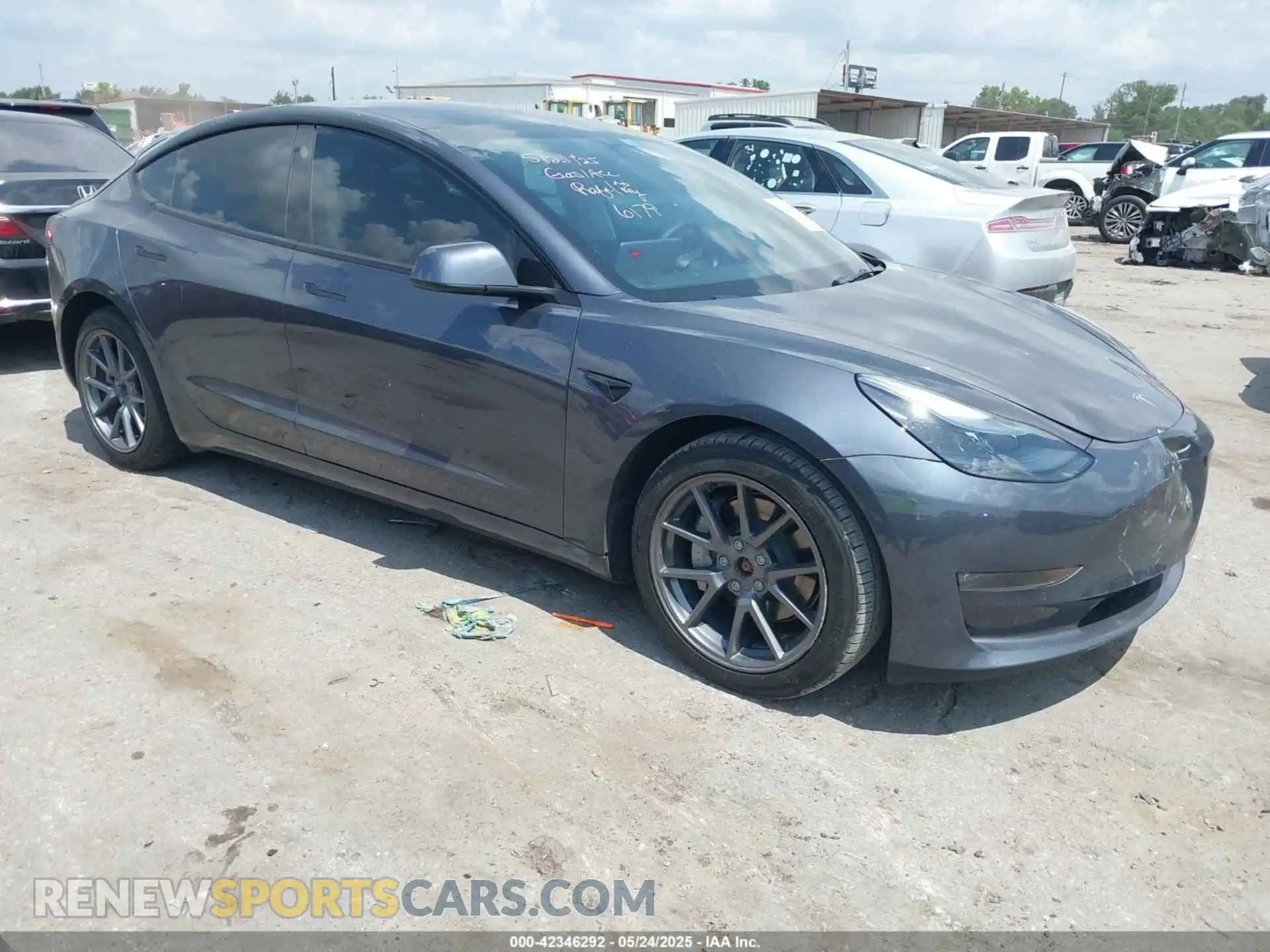 1 Photograph of a damaged car 5YJ3E1EB1NF266179 TESLA MODEL 3 2022