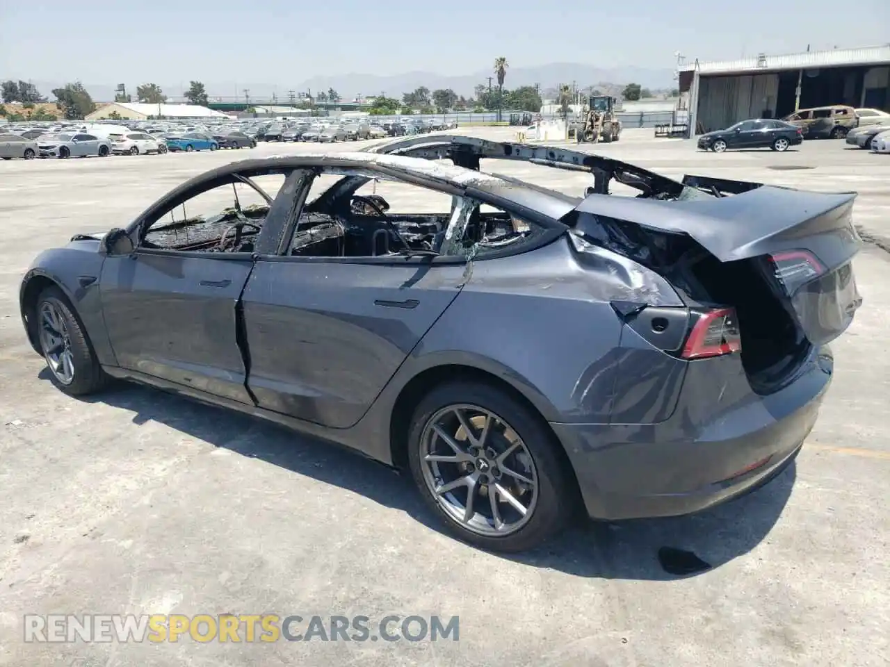 2 fotografías del automóvil dañado 5YJ3E1EB1NF274329 TESLA MODEL 3 2022
