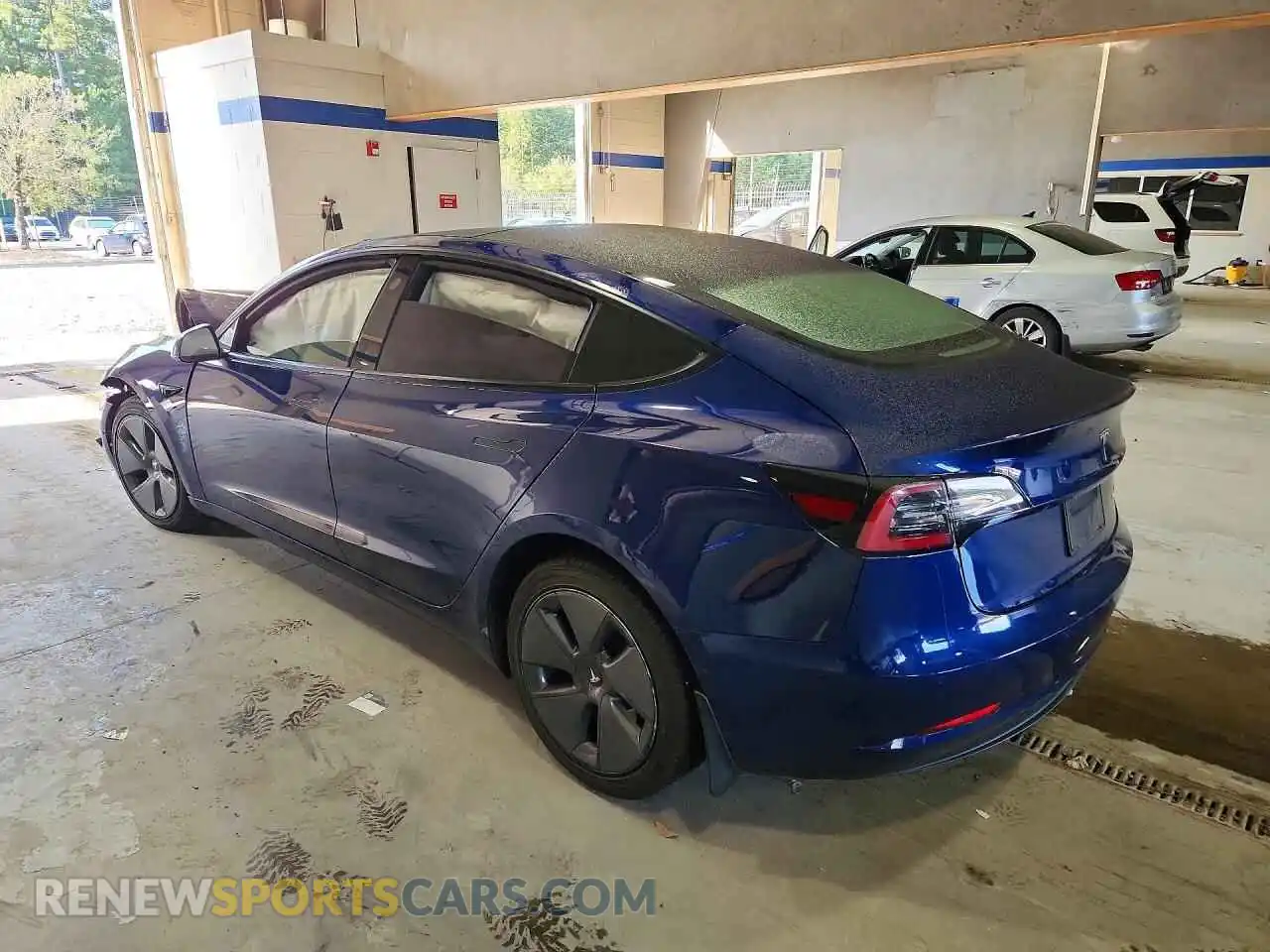 2 Photograph of a damaged car 5YJ3E1EB1NF274721 TESLA MODEL 3 2022