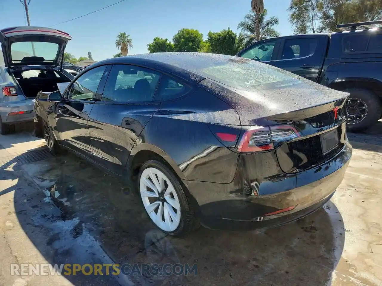 2 fotografías del automóvil dañado 5YJ3E1EB1NF287274 TESLA MODEL 3 2022