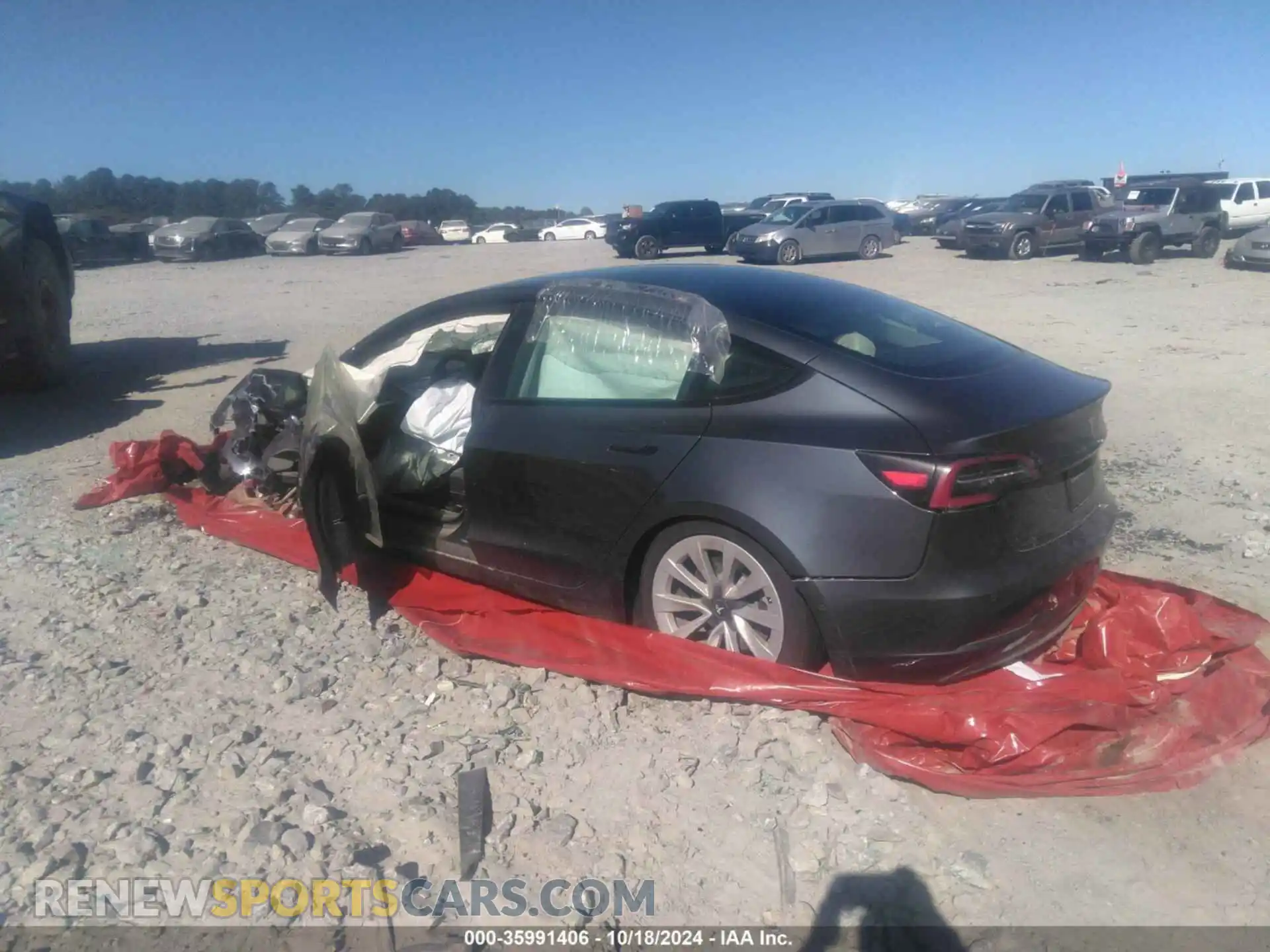 3 Photograph of a damaged car 5YJ3E1EB1NF304915 TESLA MODEL 3 2022