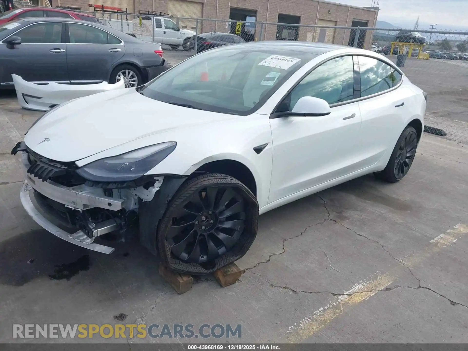 2 Photograph of a damaged car 5YJ3E1EB1NF310245 TESLA MODEL 3 2022