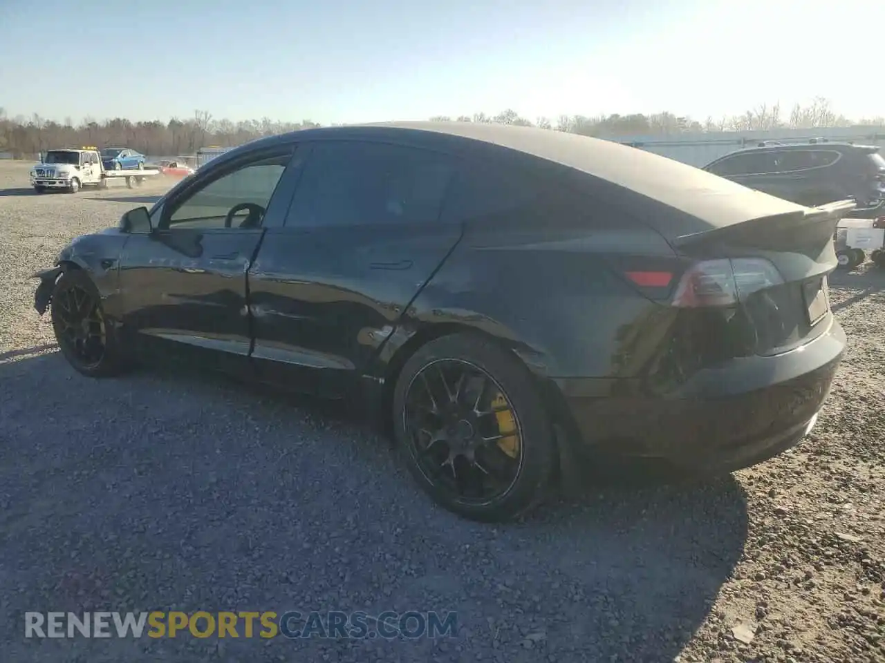 2 fotografías del automóvil dañado 5YJ3E1EB1NF314389 TESLA MODEL 3 2022