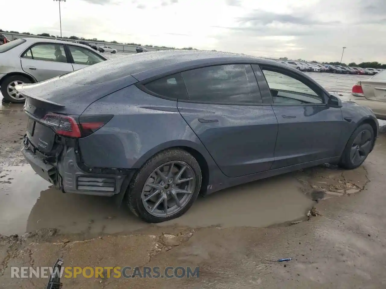 3 Photograph of a damaged car 5YJ3E1EB1NF321522 TESLA MODEL 3 2022