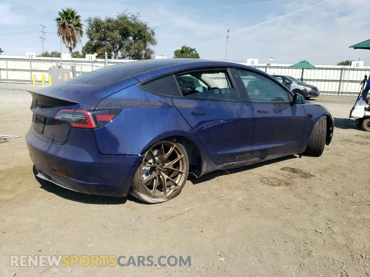 3 Photograph of a damaged car 5YJ3E1EB1NF322377 TESLA MODEL 3 2022