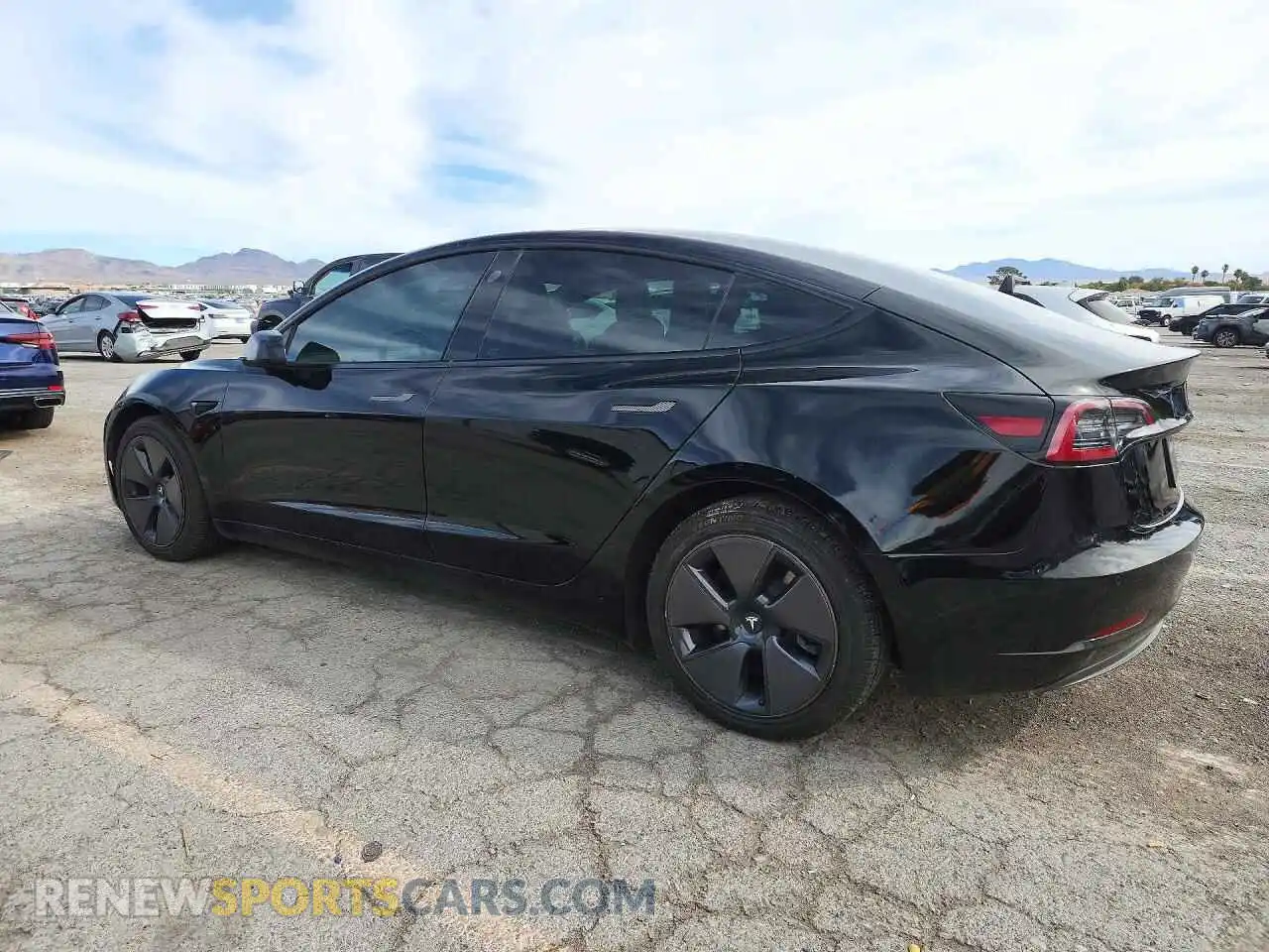 2 fotografías del automóvil dañado 5YJ3E1EB1NF345402 TESLA MODEL 3 2022