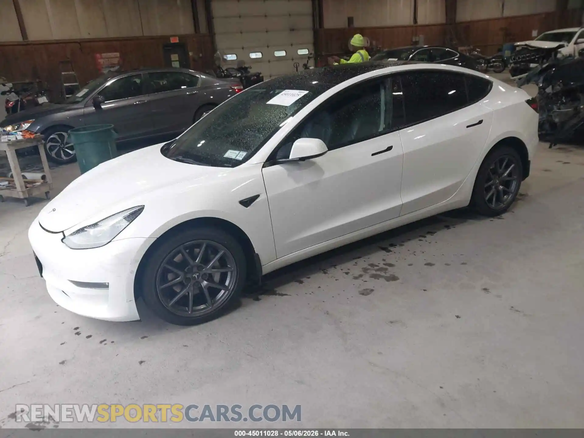 2 Photograph of a damaged car 5YJ3E1EB2NF106571 TESLA MODEL 3 2022