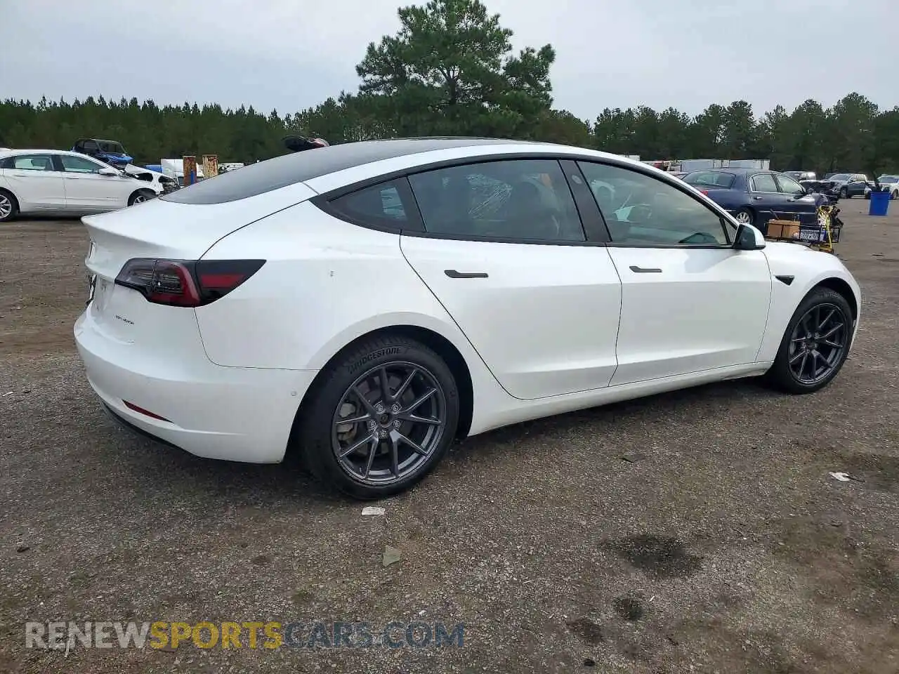 3 fotografías del automóvil dañado 5YJ3E1EB2NF112483 TESLA MODEL 3 2022