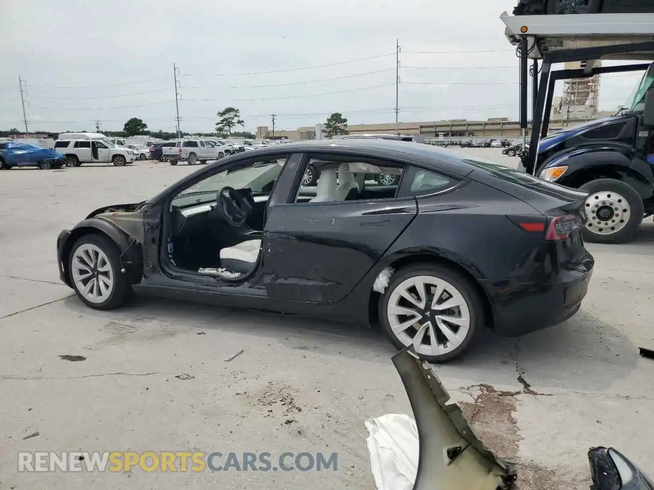 2 Photograph of a damaged car 5YJ3E1EB2NF115268 TESLA MODEL 3 2022