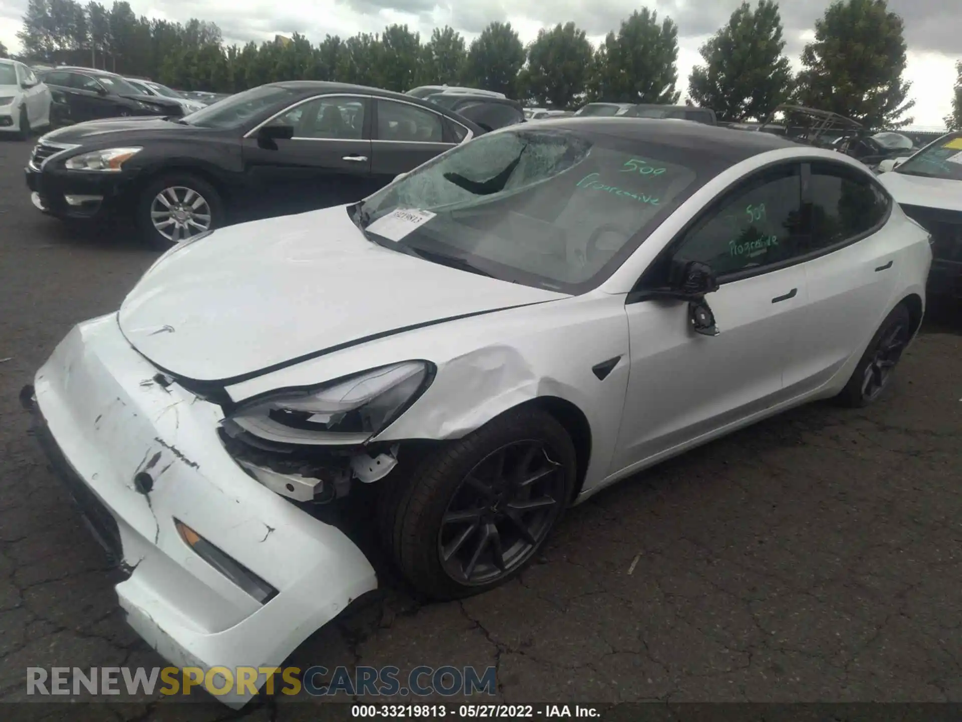 2 Photograph of a damaged car 5YJ3E1EB2NF123340 TESLA MODEL 3 2022
