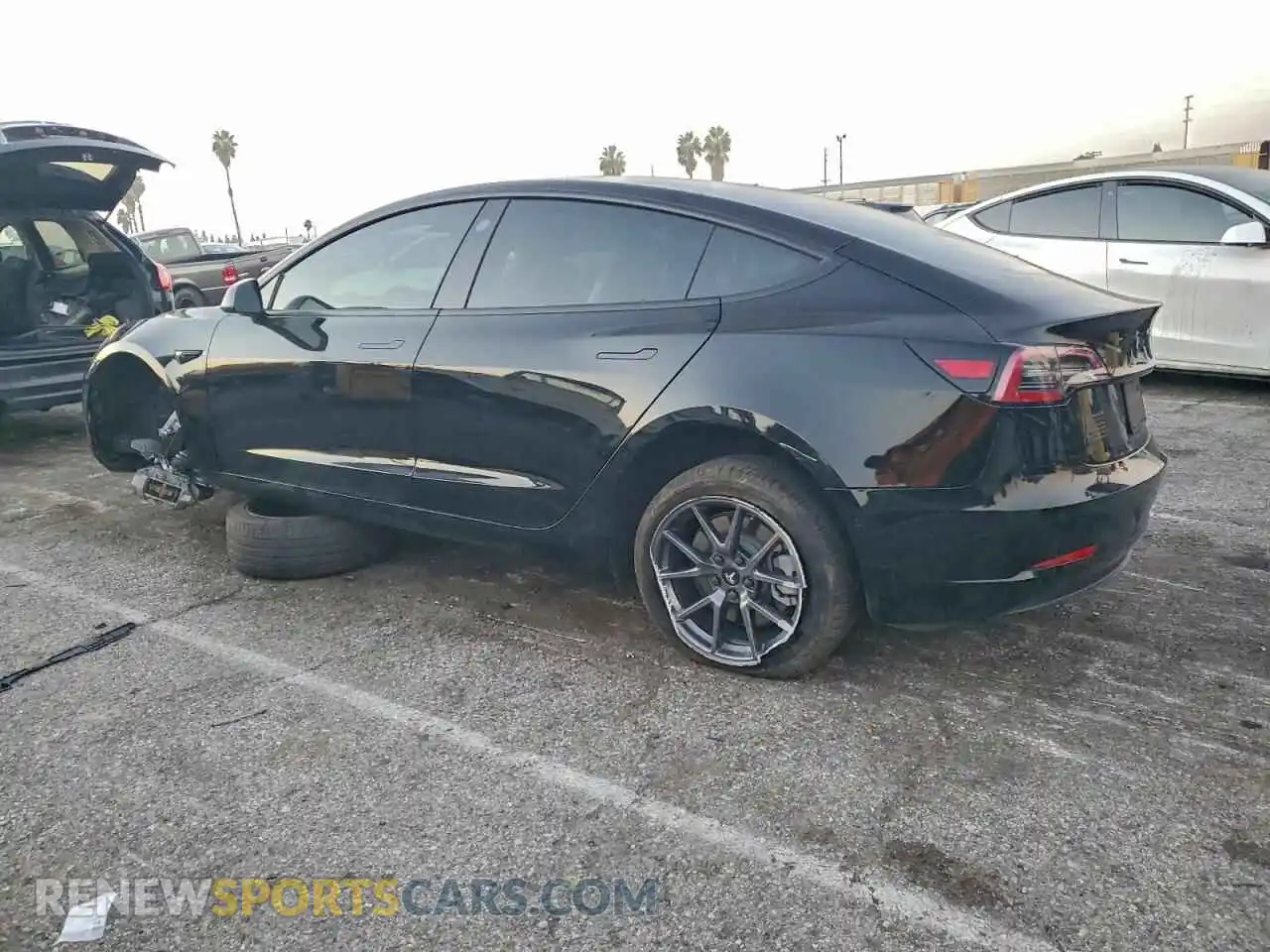 2 Photograph of a damaged car 5YJ3E1EB2NF154779 TESLA MODEL 3 2022