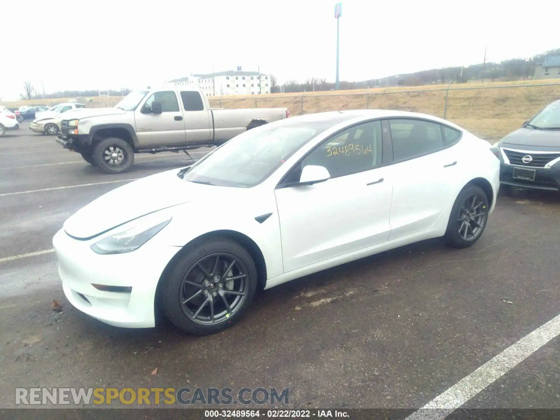 2 Photograph of a damaged car 5YJ3E1EB2NF162154 TESLA MODEL 3 2022