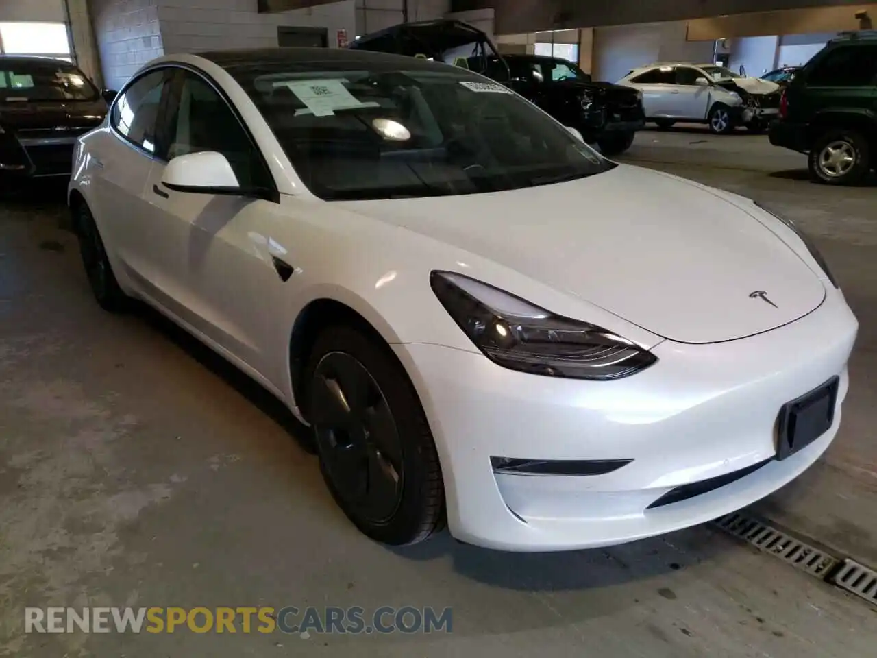 1 Photograph of a damaged car 5YJ3E1EB2NF162185 TESLA MODEL 3 2022
