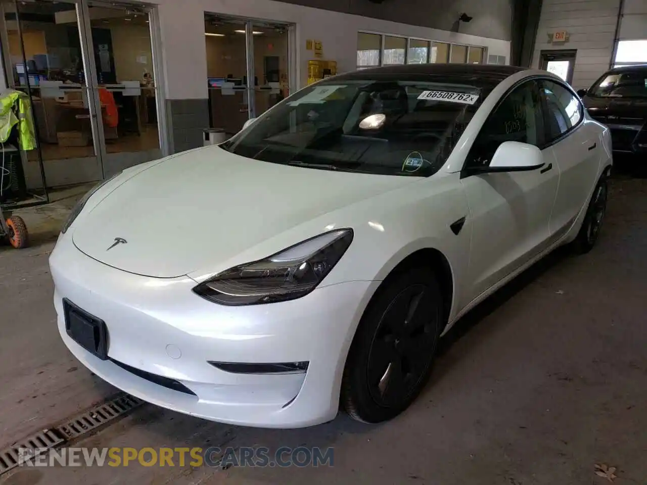 2 Photograph of a damaged car 5YJ3E1EB2NF162185 TESLA MODEL 3 2022