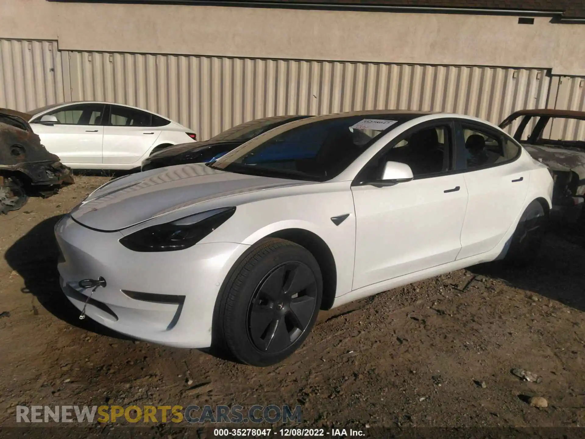2 Photograph of a damaged car 5YJ3E1EB2NF182209 TESLA MODEL 3 2022