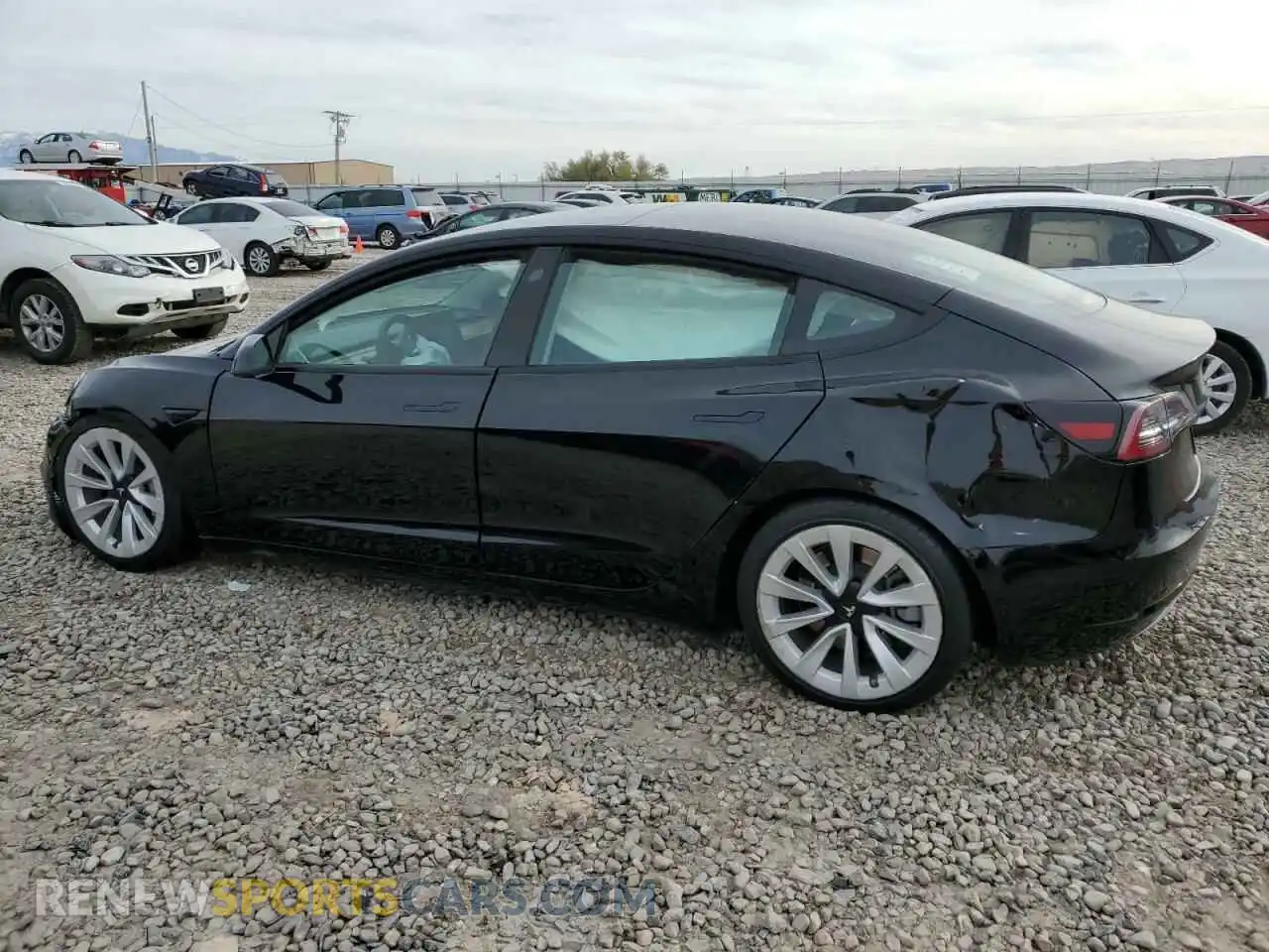 2 Photograph of a damaged car 5YJ3E1EB2NF187927 TESLA MODEL 3 2022