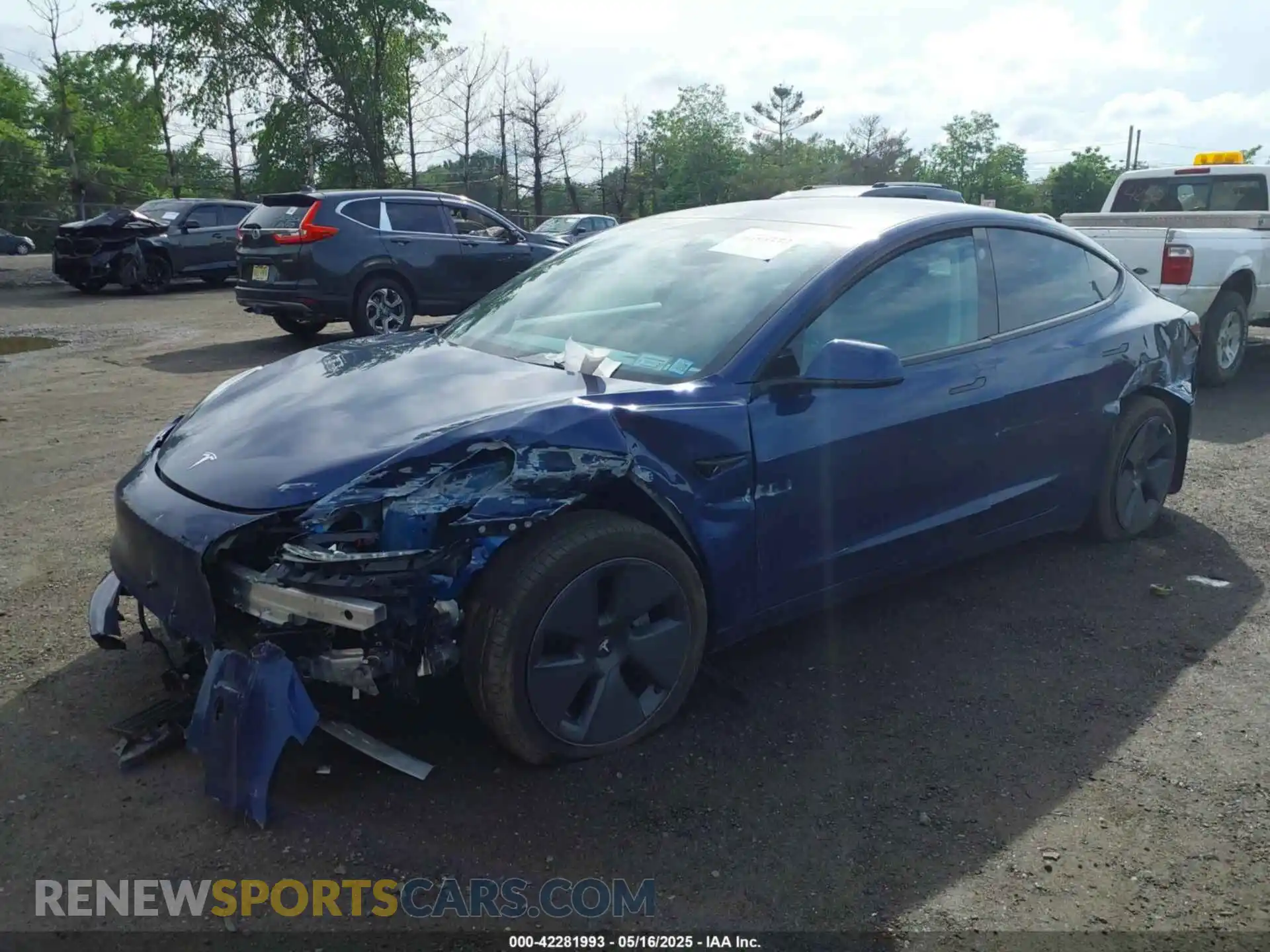 2 Photograph of a damaged car 5YJ3E1EB2NF193808 TESLA MODEL 3 2022