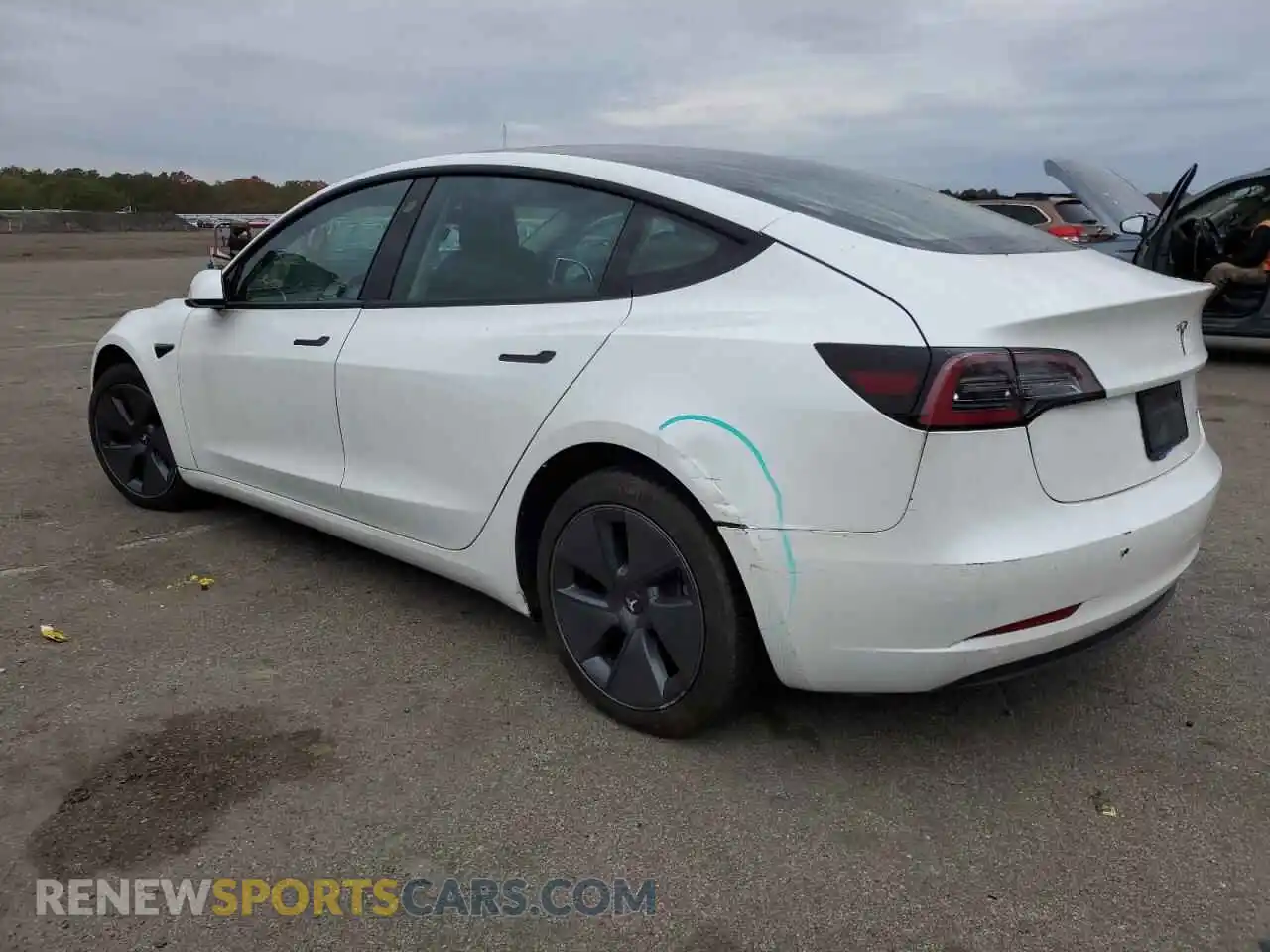 2 Photograph of a damaged car 5YJ3E1EB2NF258723 TESLA MODEL 3 2022