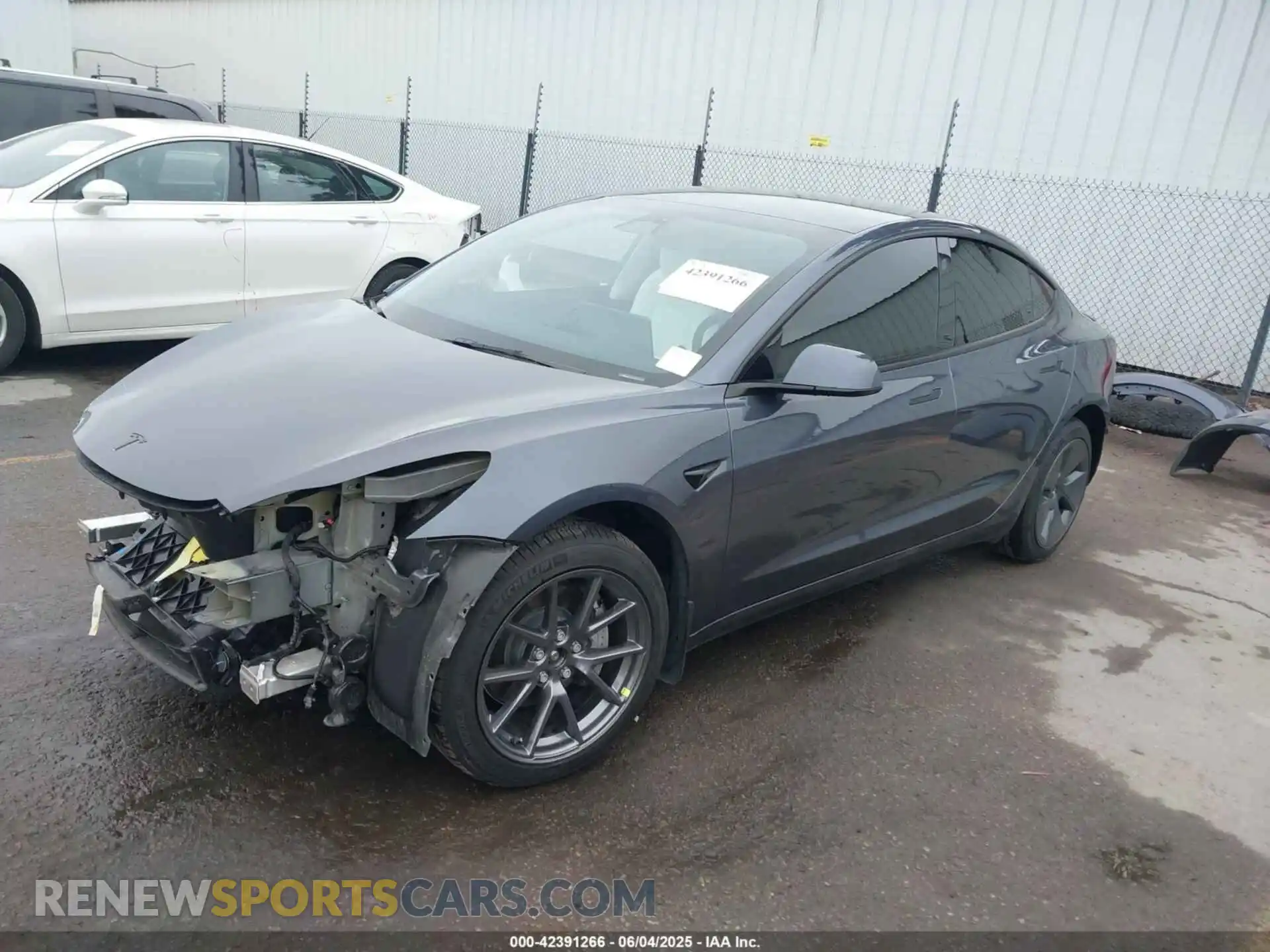 2 Photograph of a damaged car 5YJ3E1EB2NF259483 TESLA MODEL 3 2022