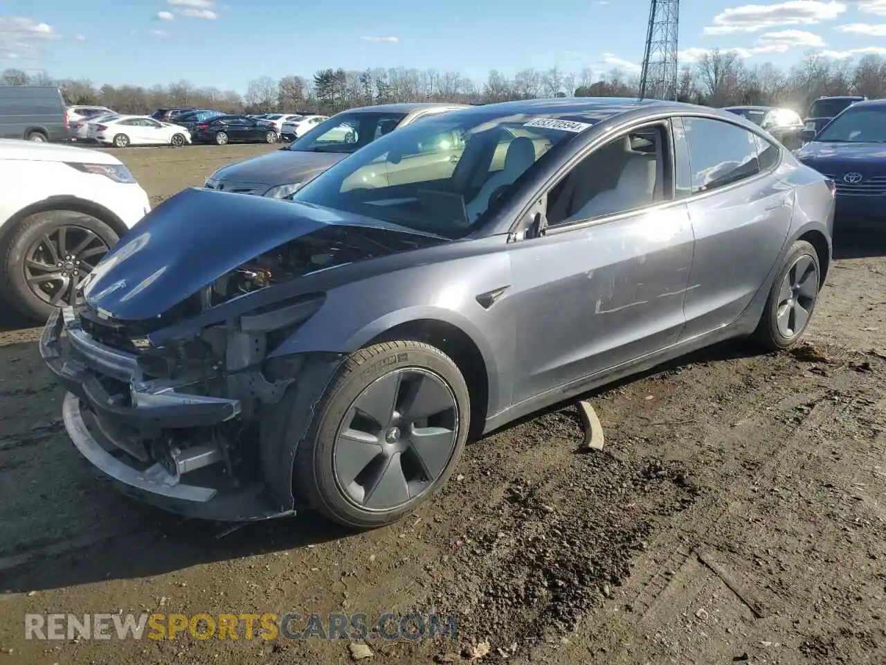 1 Photograph of a damaged car 5YJ3E1EB2NF261637 TESLA MODEL 3 2022