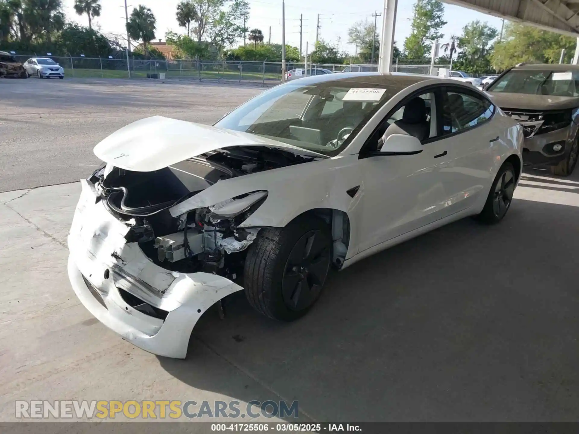 2 Photograph of a damaged car 5YJ3E1EB2NF266594 TESLA MODEL 3 2022