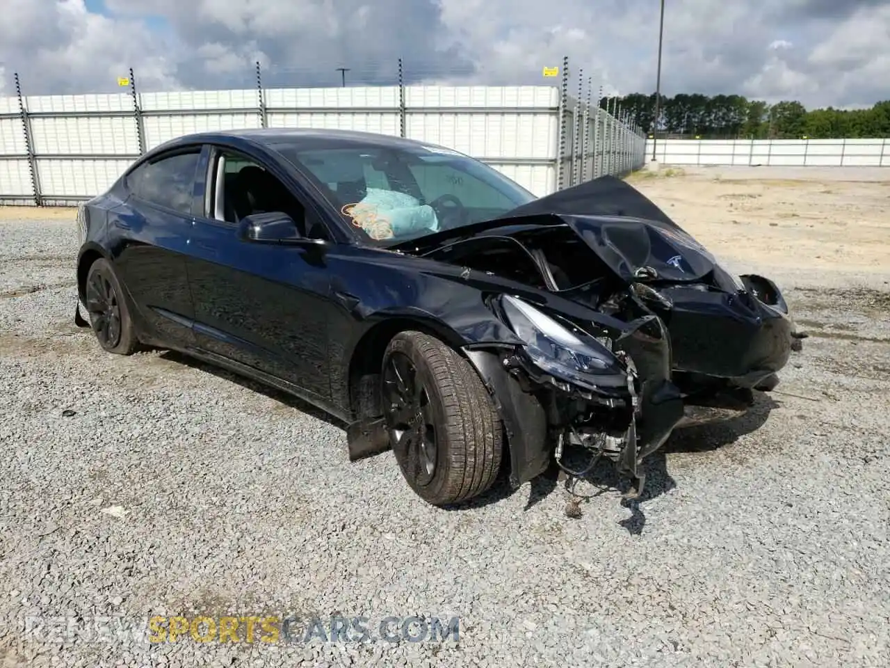 1 Photograph of a damaged car 5YJ3E1EB2NF267535 TESLA MODEL 3 2022