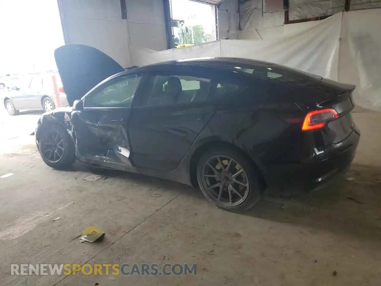 2 Photograph of a damaged car 5YJ3E1EB2NF285646 TESLA MODEL 3 2022