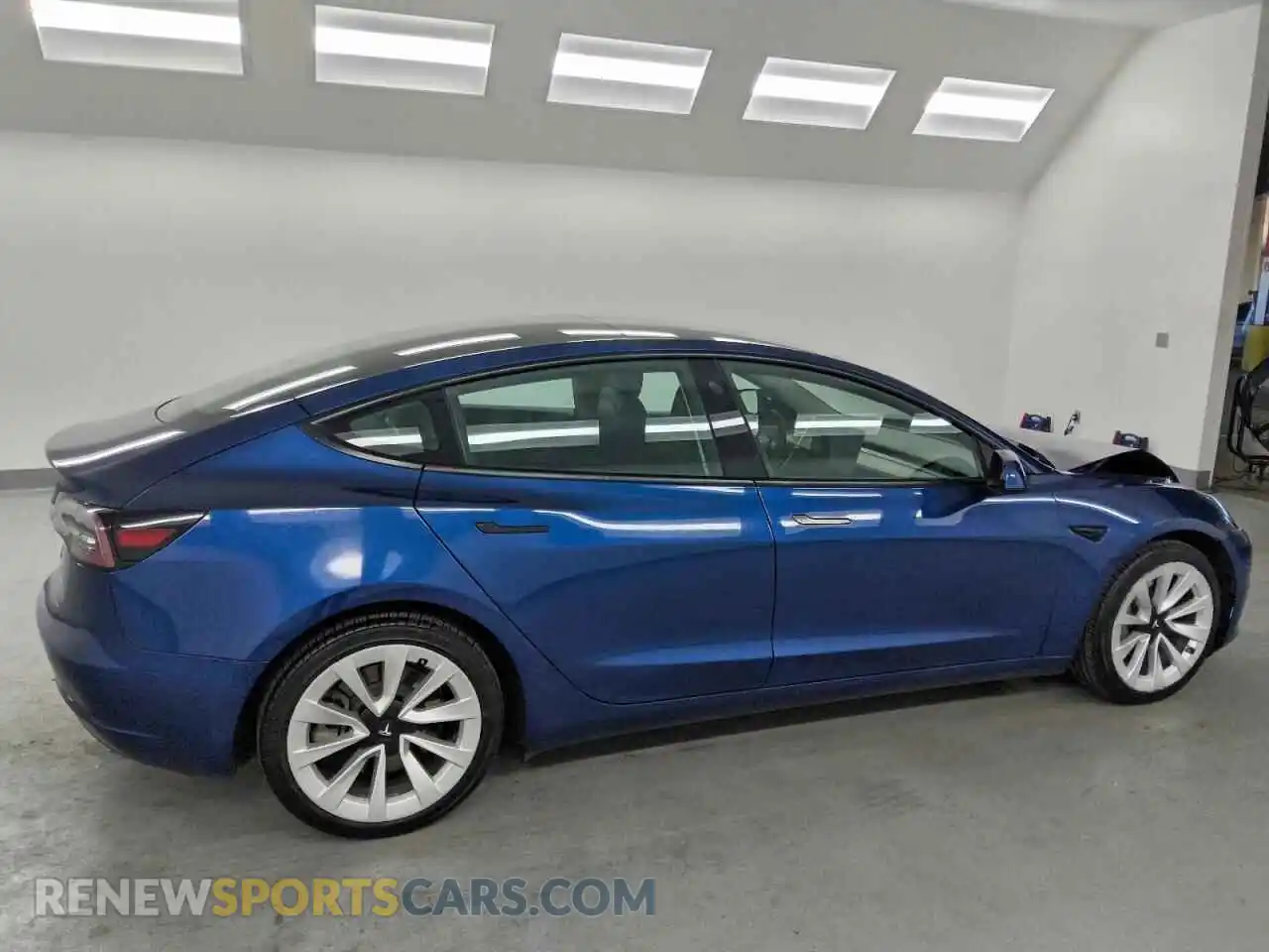3 Photograph of a damaged car 5YJ3E1EB2NF305166 TESLA MODEL 3 2022