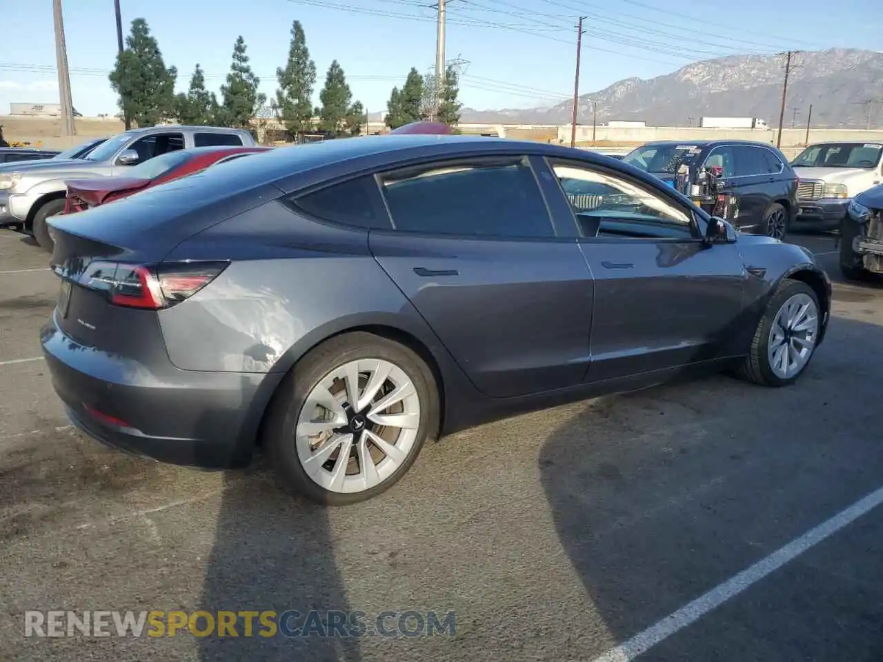 3 Фотография поврежденного автомобиля 5YJ3E1EB3NF134864 TESLA MODEL 3 2022