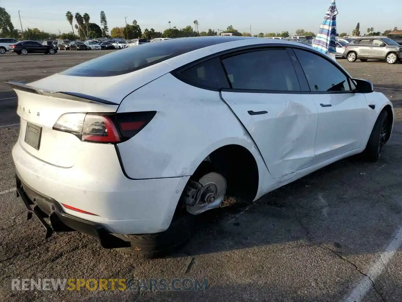 3 Photograph of a damaged car 5YJ3E1EB3NF136114 TESLA MODEL 3 2022