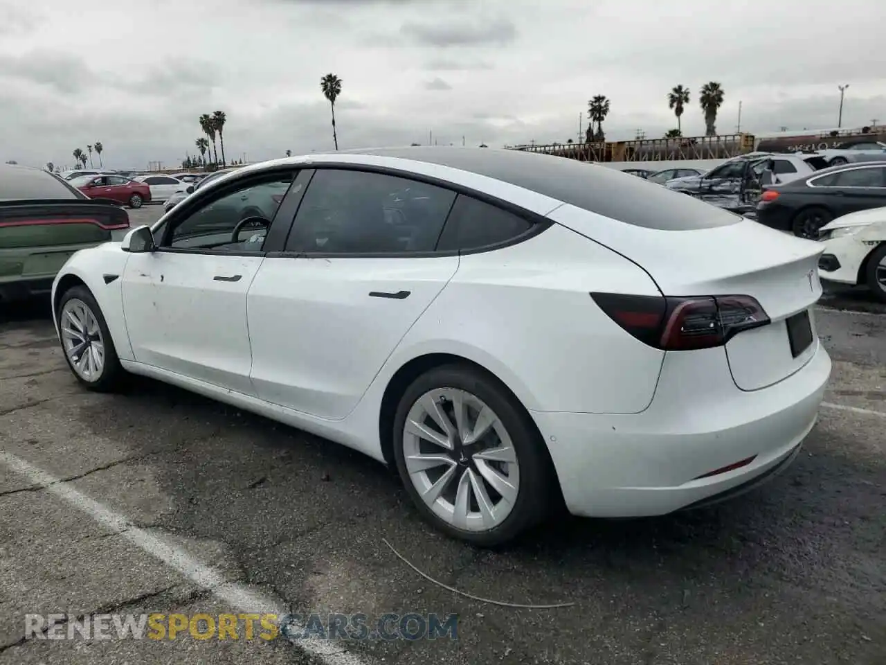 2 fotografías del automóvil dañado 5YJ3E1EB3NF136551 TESLA MODEL 3 2022