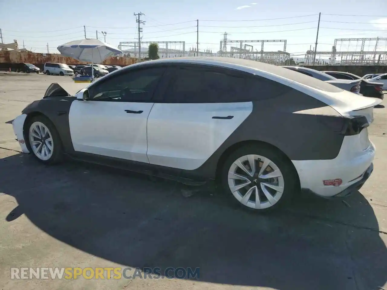 2 fotografías del automóvil dañado 5YJ3E1EB3NF143581 TESLA MODEL 3 2022