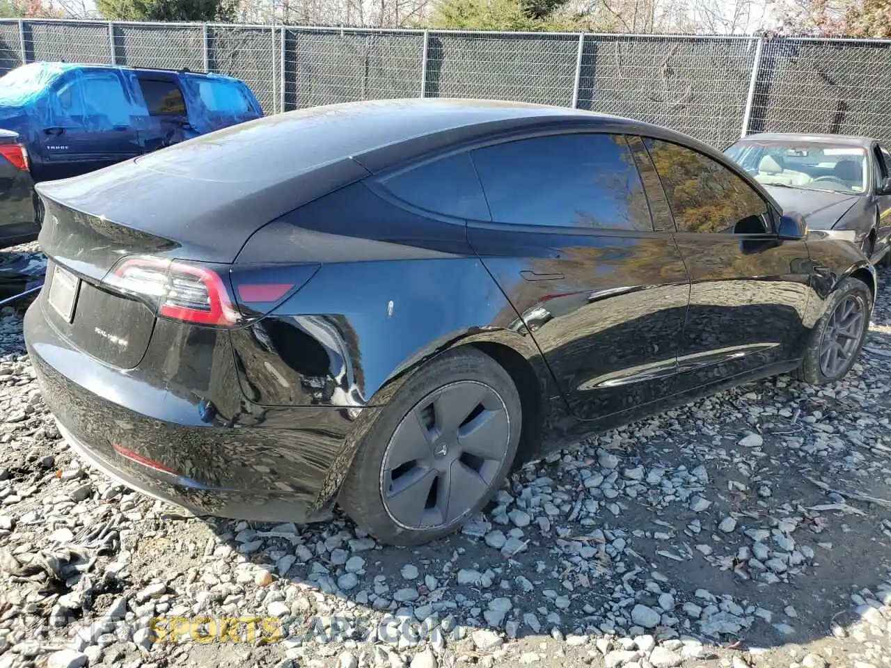 3 Photograph of a damaged car 5YJ3E1EB3NF183336 TESLA MODEL 3 2022