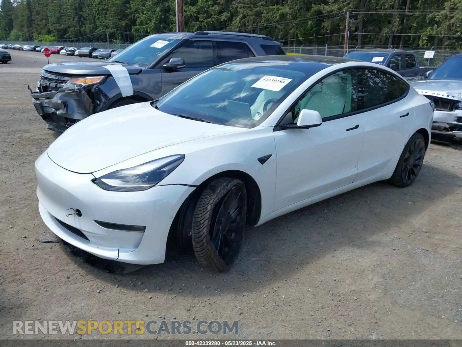 2 Photograph of a damaged car 5YJ3E1EB3NF203181 TESLA MODEL 3 2022