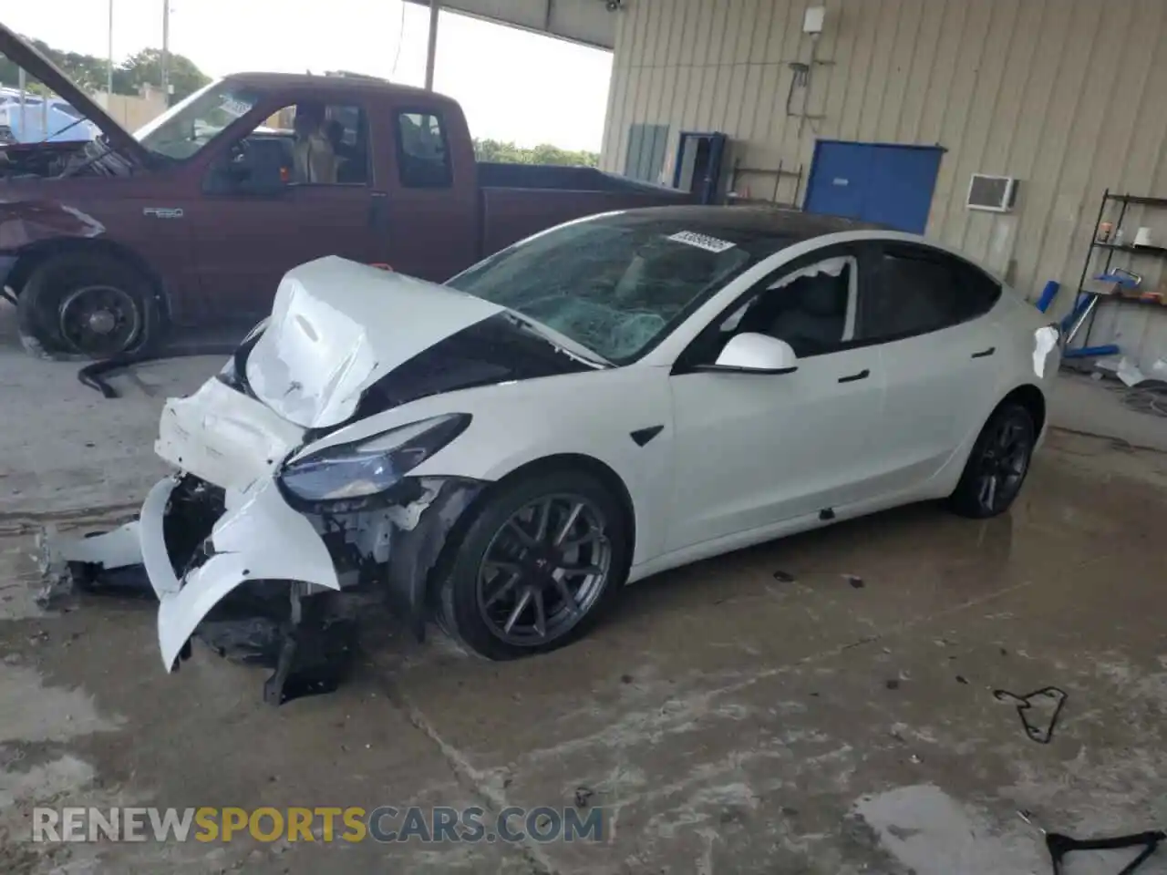 1 Photograph of a damaged car 5YJ3E1EB3NF206565 TESLA MODEL 3 2022