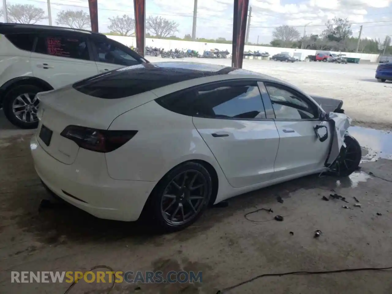 3 Photograph of a damaged car 5YJ3E1EB3NF206565 TESLA MODEL 3 2022