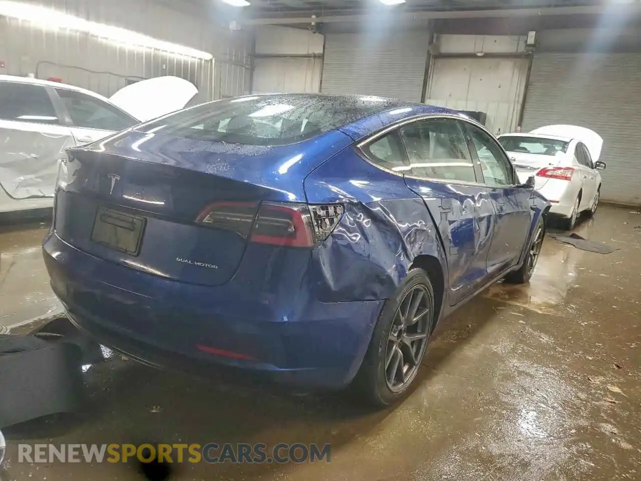 3 Photograph of a damaged car 5YJ3E1EB3NF229327 TESLA MODEL 3 2022