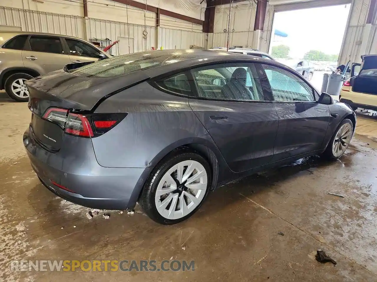 3 Photograph of a damaged car 5YJ3E1EB3NF247066 TESLA MODEL 3 2022