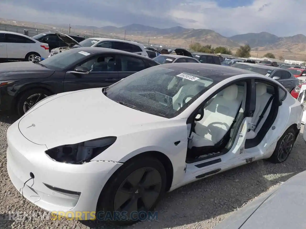1 Photograph of a damaged car 5YJ3E1EB3NF277846 TESLA MODEL 3 2022