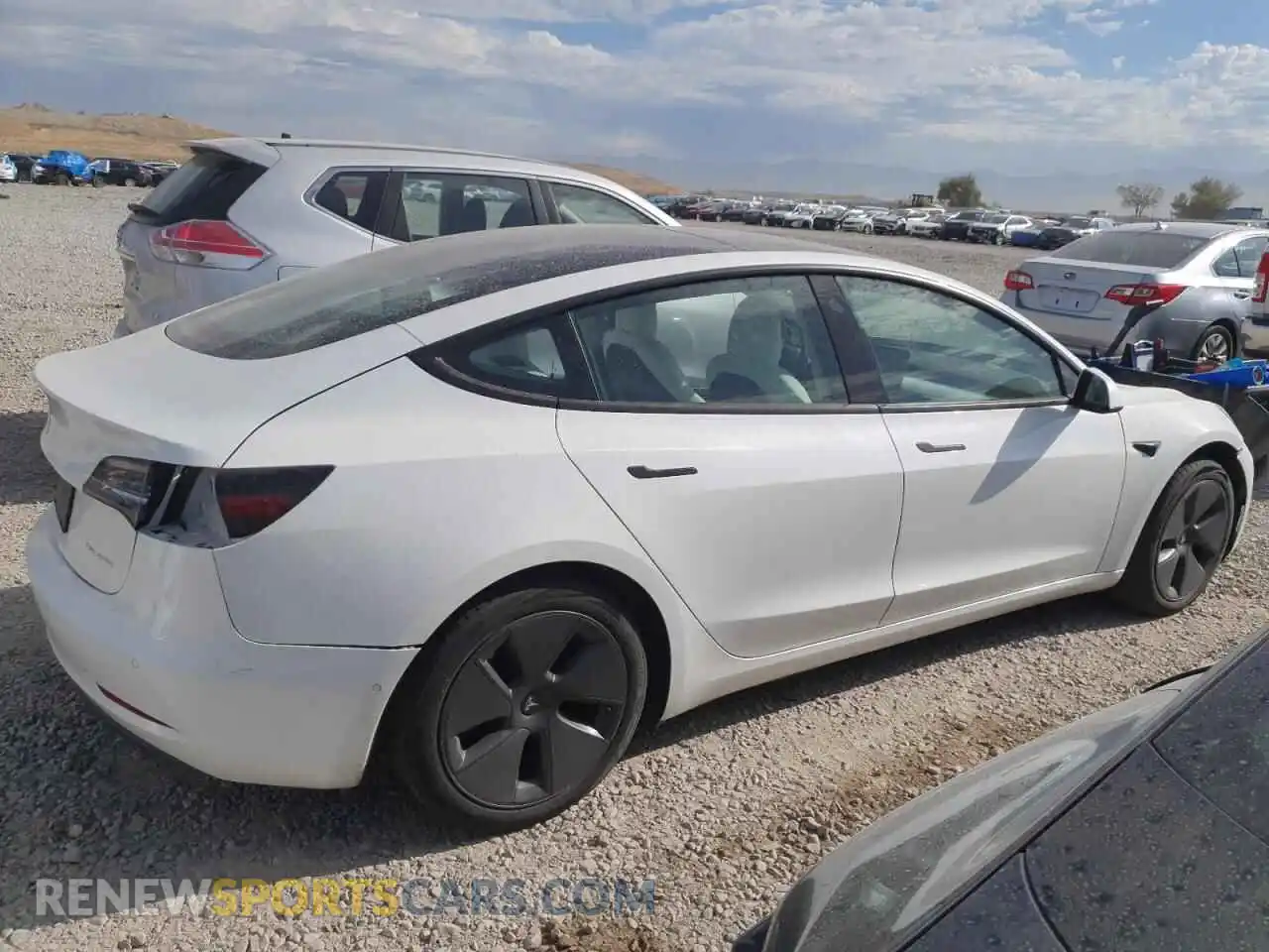 3 Photograph of a damaged car 5YJ3E1EB3NF277846 TESLA MODEL 3 2022