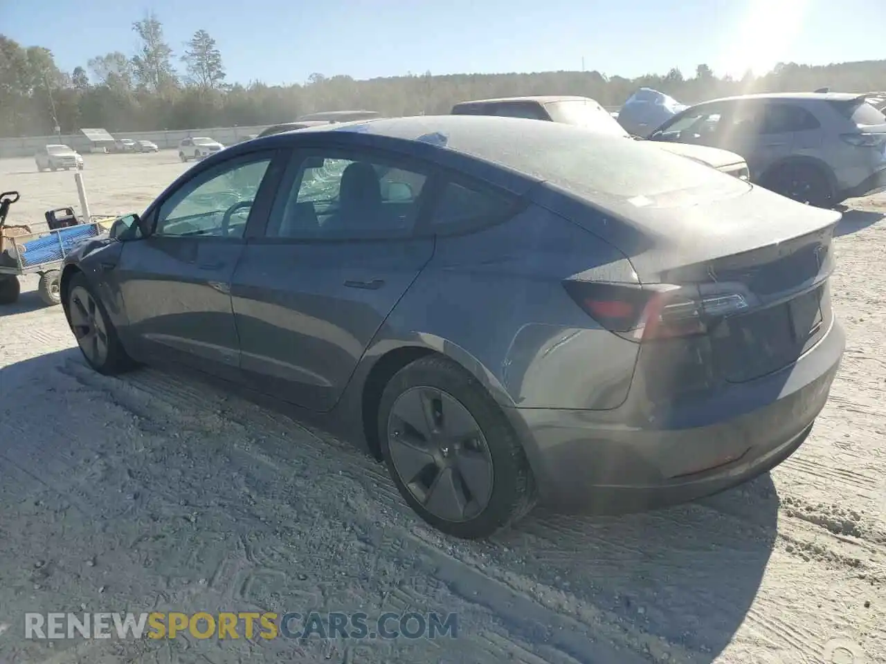 2 fotografías del automóvil dañado 5YJ3E1EB3NF277877 TESLA MODEL 3 2022