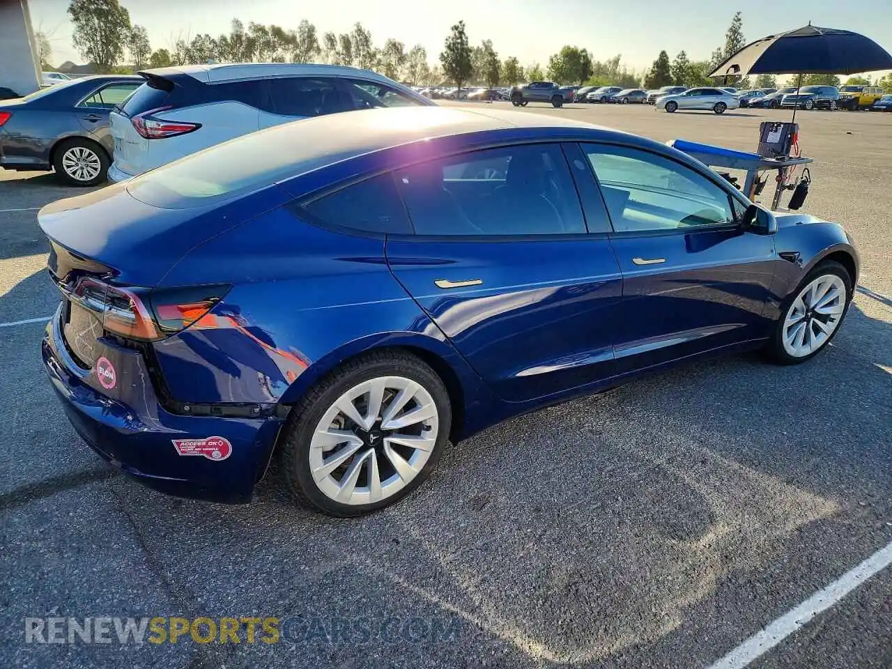 3 Photograph of a damaged car 5YJ3E1EB4NF142567 TESLA MODEL 3 2022