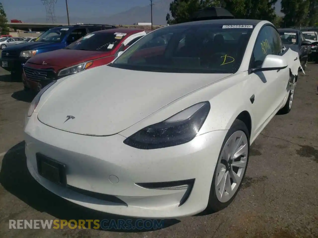 2 Photograph of a damaged car 5YJ3E1EB4NF145386 TESLA MODEL 3 2022