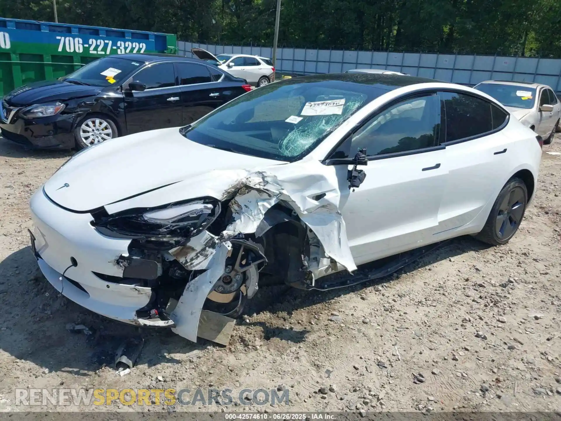 2 Photograph of a damaged car 5YJ3E1EB4NF153035 TESLA MODEL 3 2022