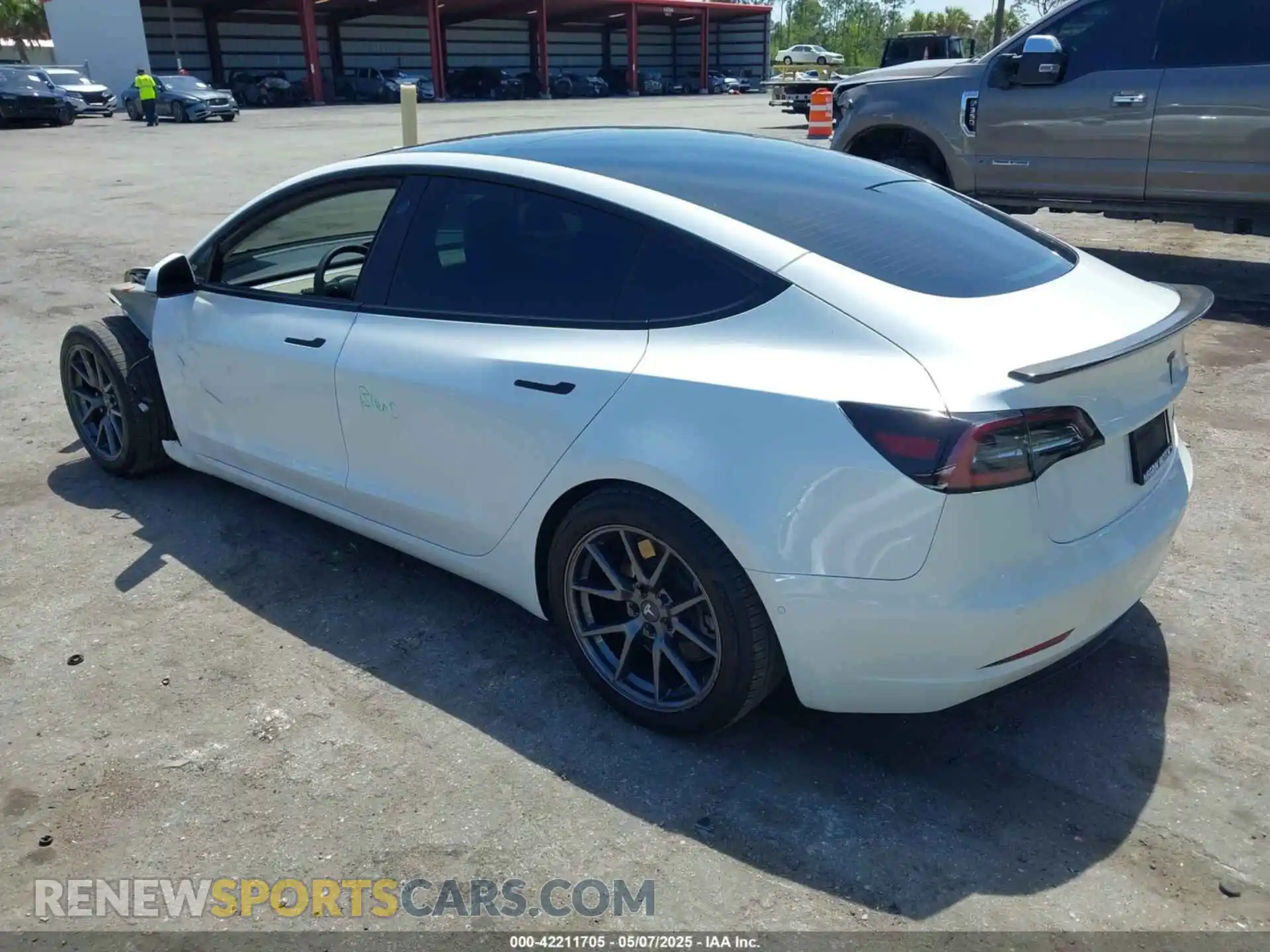 3 Photograph of a damaged car 5YJ3E1EB4NF163001 TESLA MODEL 3 2022